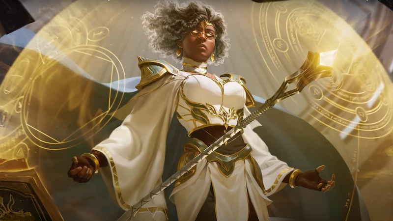 Art from the new revised 2024 Player's Handbook for DnD 5e, featuring a female wizard in white robes surrounded by a glowing yellow shield of energy.