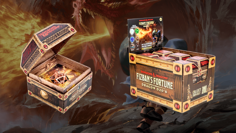 A single box and a retail box of the official D&D Fizban's Fortune mystery D20 from FanRoll.