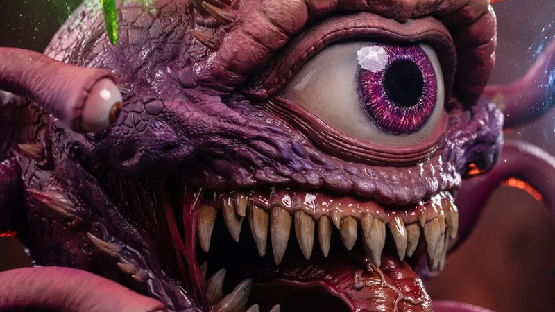 A close up of the central eye and mouth of the new D&D Beholder statue from Iron Studios.